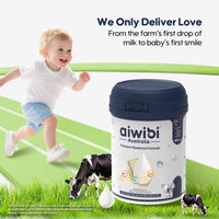Aiwibi Australia premium newborn formula container with a child running and cows in the background on a grassy field.