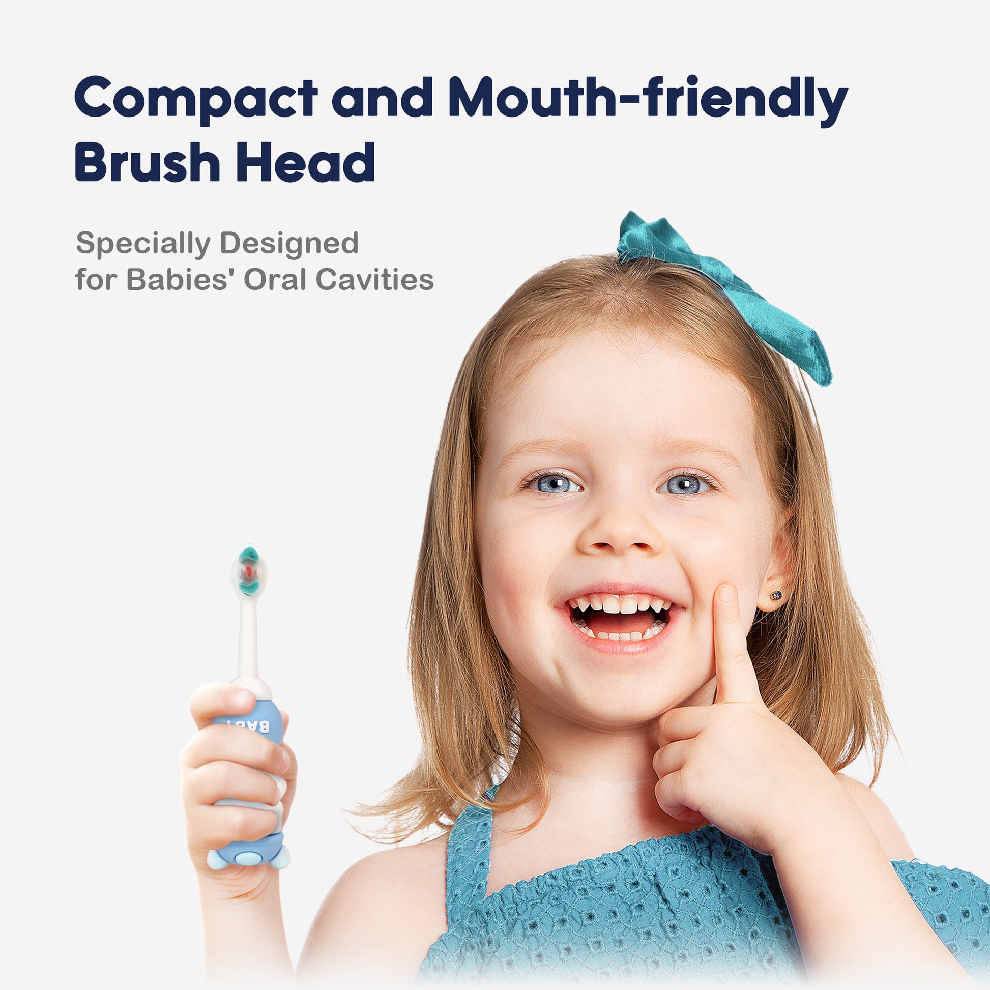 A little girl happily holds her Aiwibi Kid's Toothbrush, specially designed for delicate mouths. 